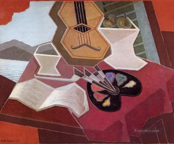 three women at the table by the lamp Painting - table overlooking the sea 1925 Juan Gris